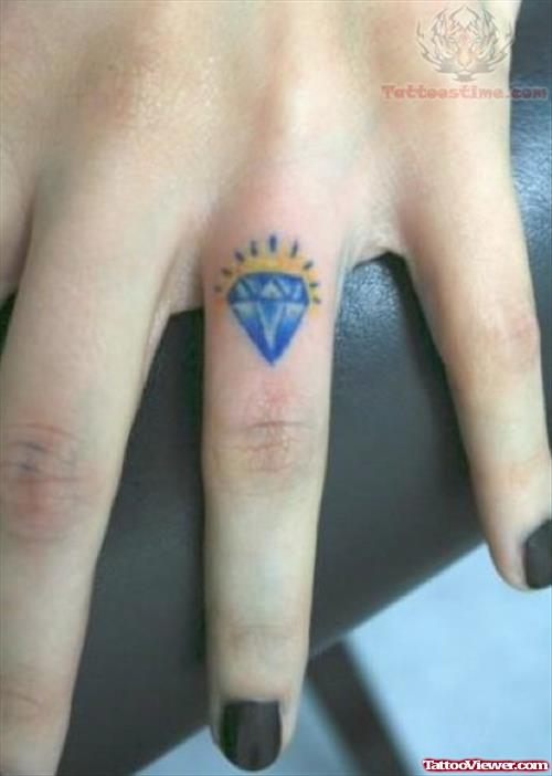 Blue Diamond Ring Tattoo