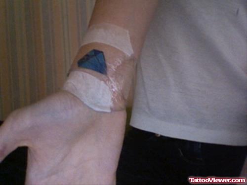 Blue Diamond Tattoo On Guy Wrist
