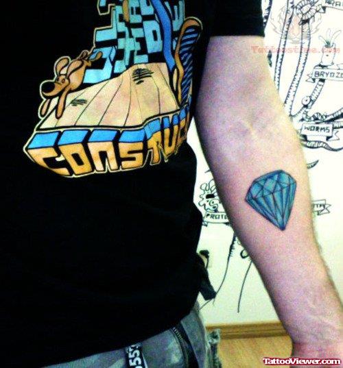 Blue Diamond Tattooed On Arm