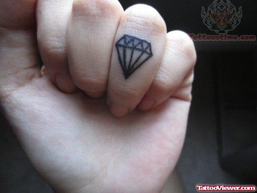 Tiny Black Ink Diamond Tattoo