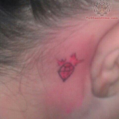 Small Red Diamond Tattoo Behind Ear