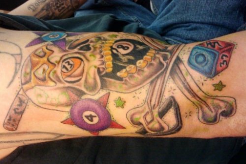 Skull With Eightball And Dice Tattoo