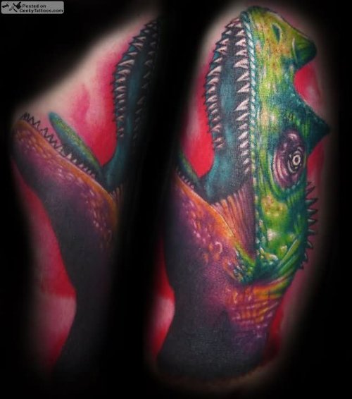 Unique Colored Dinosaur Tattoo On Sleeve
