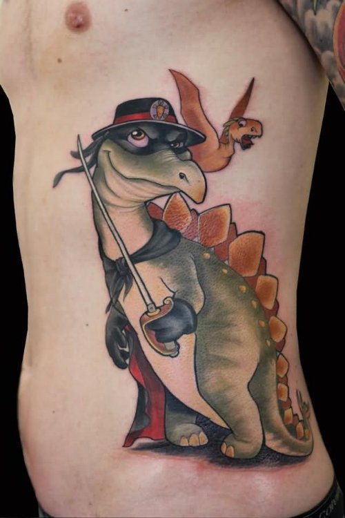 Man Left Rib Side Dinosaur Tattoo