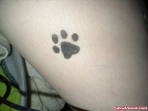 Tiny Paw Print Tattoo