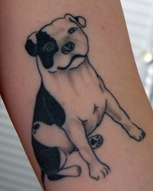 White and Black Ink Dog Tattoo