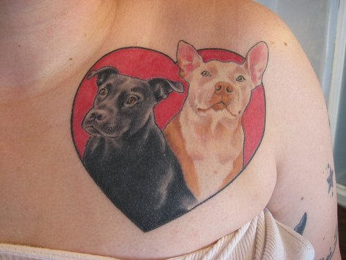 Red Heart And Dogs Tattoo On Chest