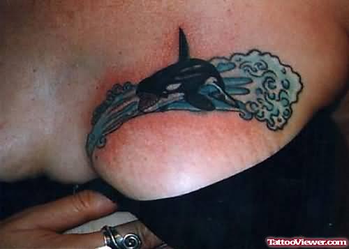 Water And Dolphin Tattoo