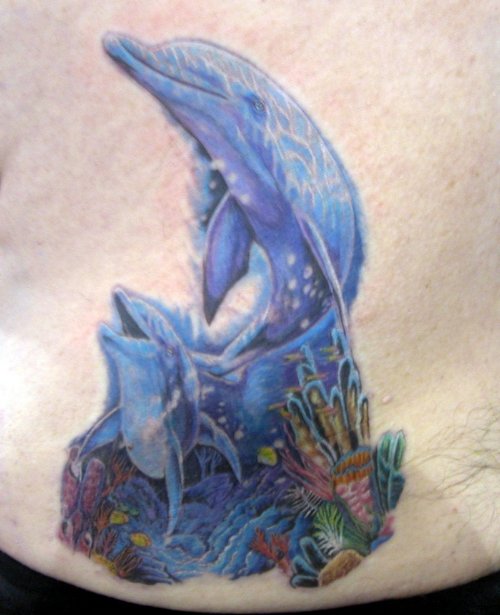 Blue Ink Dolphins Under Sea Tattoo On Lower Back