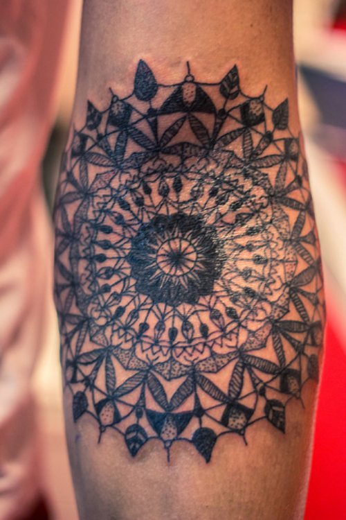 Grey Ink Dotwork Flower Tattoo On Left Arm