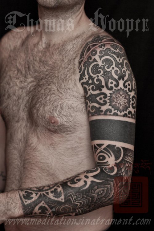 Nice Dotwork Tattoo On Man Left Sleeve