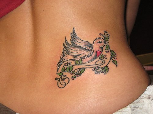 Peace and Dove Tattoo On Lowerback