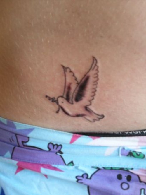 Grey Ink Flying Dove Tattoo On Hip