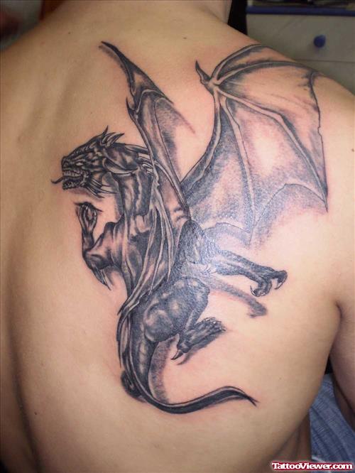 Grey Ink Dragon Tattoo On Right Back Body
