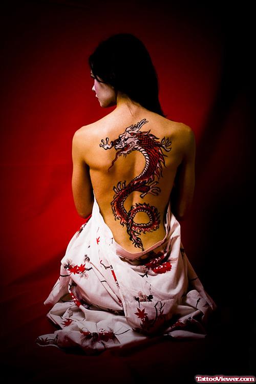 Red Ink Dragon Tattoo On Girl Back