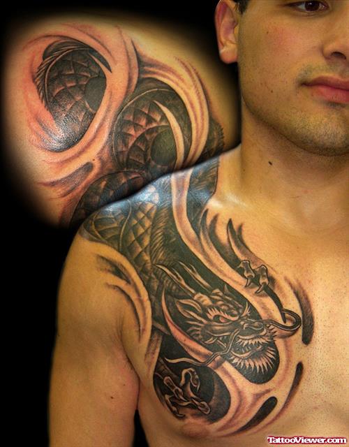 Black Ink Dragon Tattoo On Man Chest