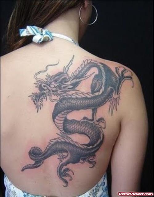 Grey Ink Dragon Tattoo On Girl Right Back Shoulder