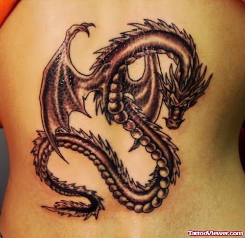 Nice Grey Ink Dragon Tattoo On Back Body