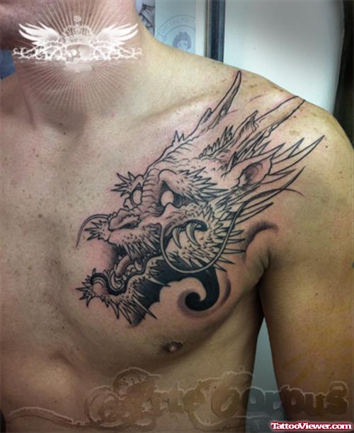 Grey Ink Dragon Tattoo On Man Chest
