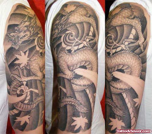 Grey Ink Dragon Tattoo On Man Half Sleeve