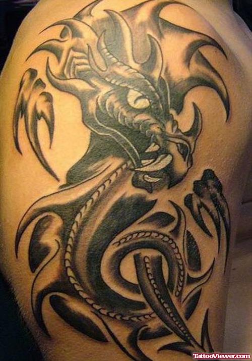 Black Ink Tribal And Dragon Tattoo On Half Sleeve