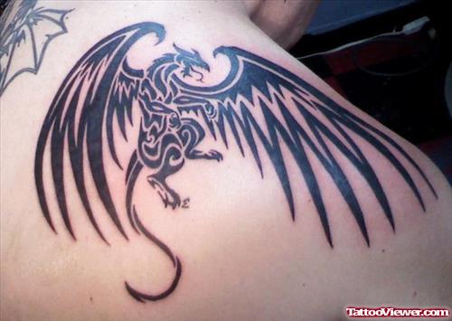 Black Ink Flying Dragon Tattoo On Right Back Shoulder