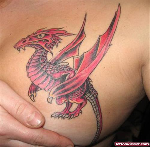 Red Ink Dragon Tattoo On Girl Chest