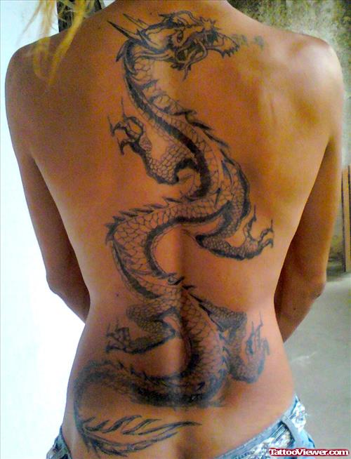 Grey Ink Dragon Tattoo On Girl Back Body