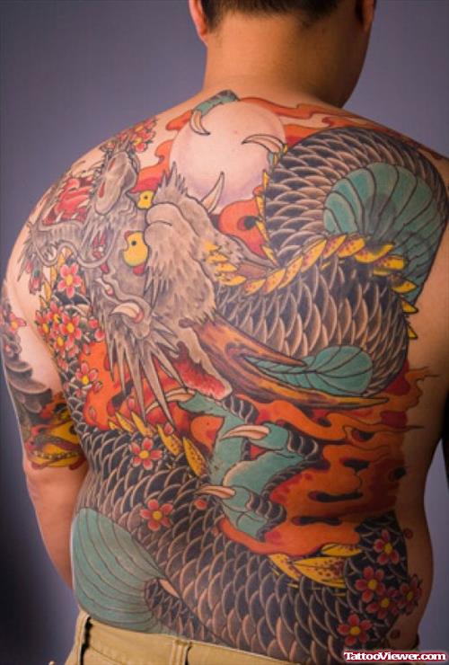 Colored Ink Dragon Tattoo On Man Back