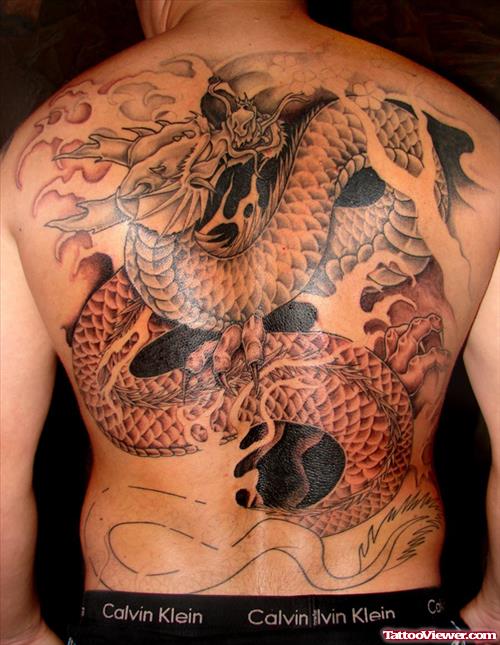 Beautiful Grey Ink Dragon Tattoo On Man Full Back