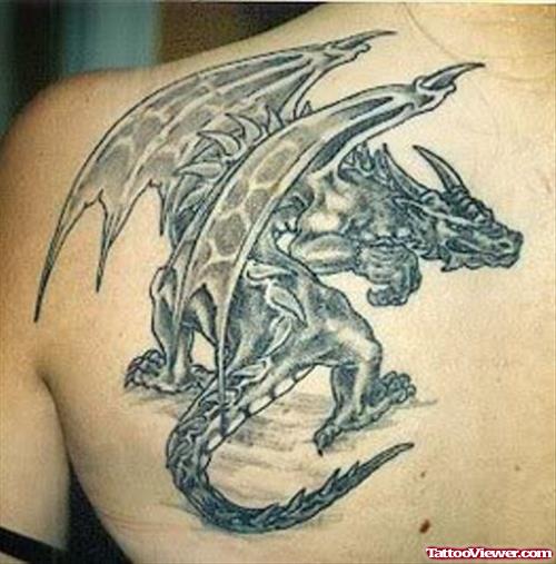 Awesome Grey Ink Dragon Tattoo On Left Back Shoulder