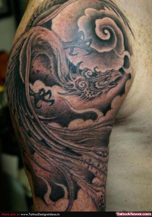 Grey Ink Cloud And Dragon Tattoo On Half Sleeve