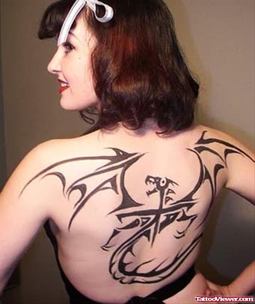Beautiful Tribal Dragon Tattoo On Girl Back Body