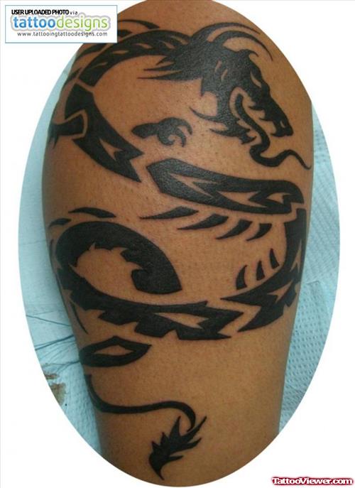Awesome Black Tribal Dragon Tattoo