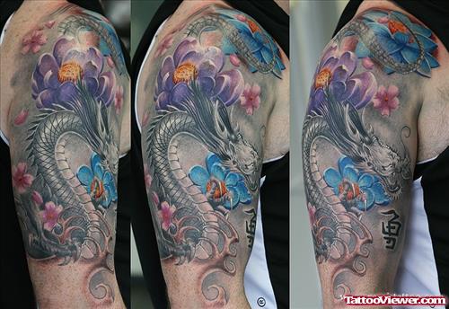 Colored Flowers And Dragon Tattoo On Half Sleeve