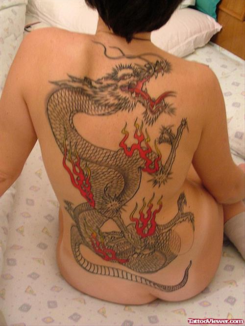 Grey Ink Fire Dragon Tattoo On Girl Back