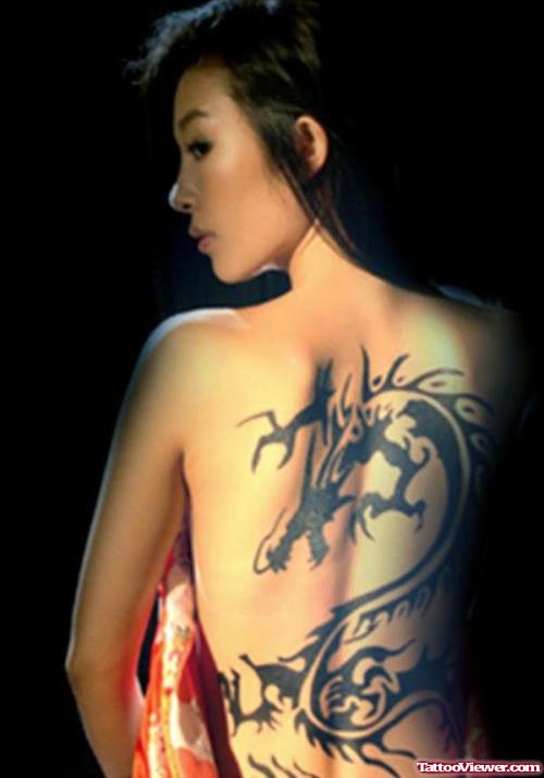 Tribal Dragon Tattoo On Girl Back
