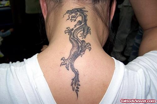 Grey Ink Dragon Tattoo On Girl Back Neck