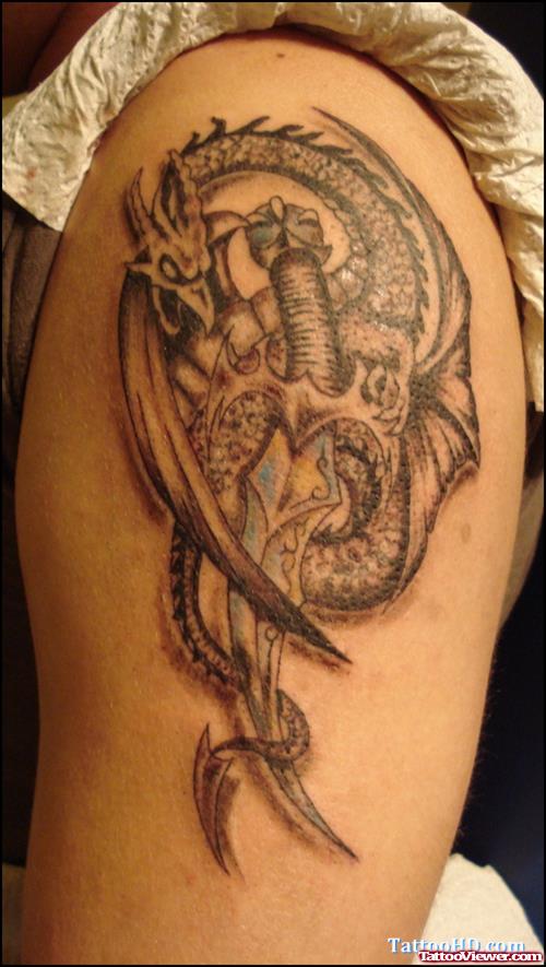 Amazing Grey Ink Dragon Tattoo On Left Shoulder