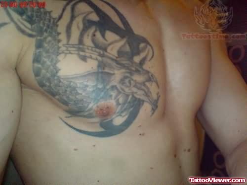 Grey Ink Dragon Tattoo On Chest
