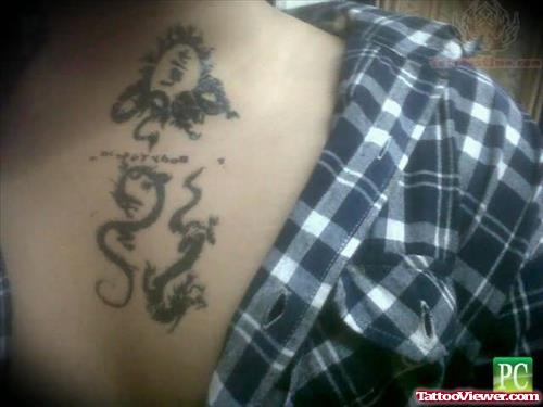 Dragon And Symbol Tattoo