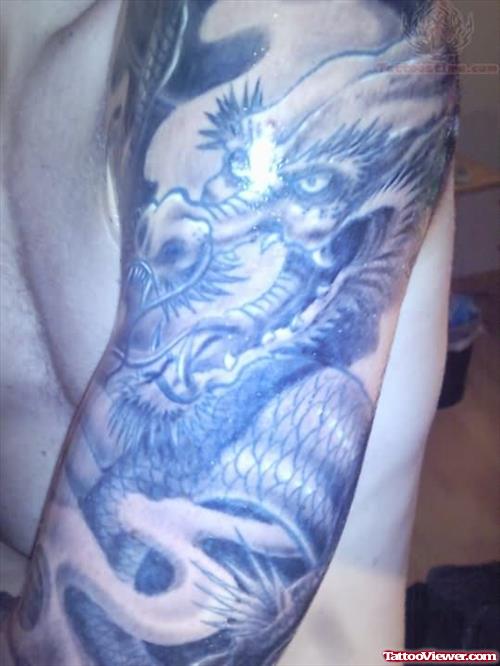 Dragon Grey Ink Tattoo On Half Sleeve