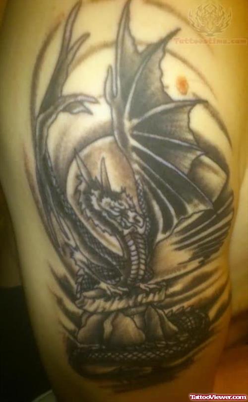 Large Winged Dragon Tattoo On Bicep