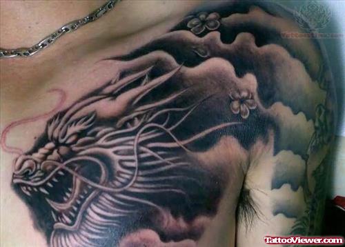 Grey ink Dragon Tattoo On Chest And Shoulder