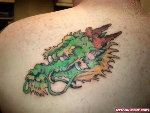 Green Ink Dragon Head Tattoo On Back Shoulder