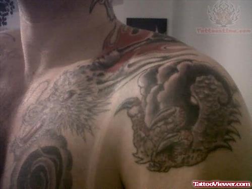Dragon Head Tattoo On Collarbone