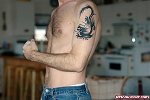 Elegant Dragon Tattoo For Biceps