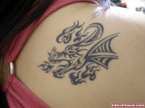 Attarctive Tribal Dragon Tattoo On Back