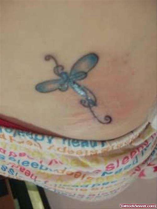 Dragonfly Tattoo On Lower Waist