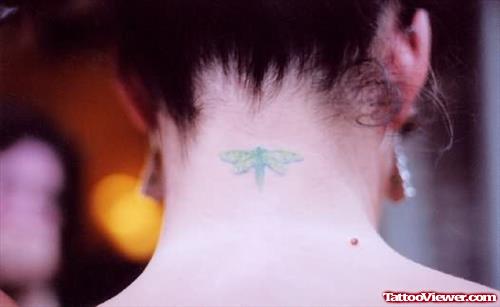 Tiny Dragonfly Tattoo On Back Neck